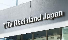TÜV Rheinland Japan signage and logo